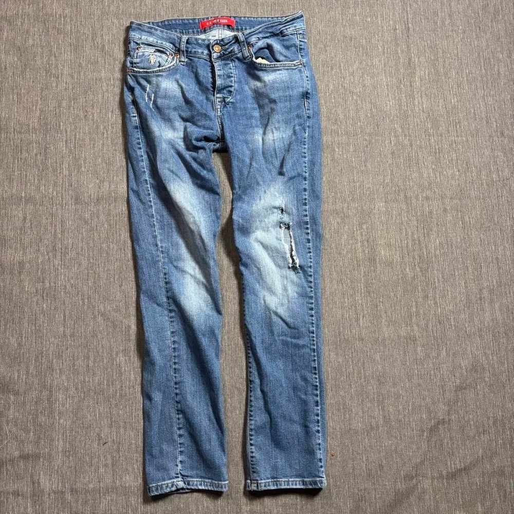 U.S. Polo Assn. blue denim jeans with a distressed look